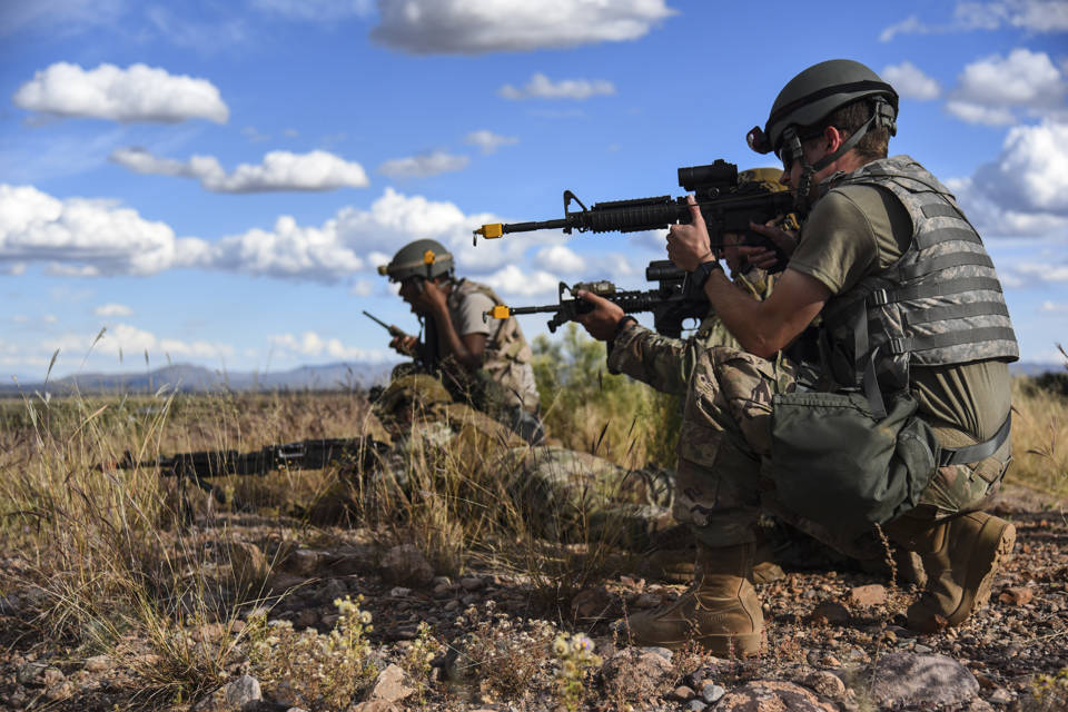 Airmen of the 355th Wing respond to a simulated attack during Exercise Bushwhacker 19-08 at Libby Army Airfield, Ariz., Nov. 5, 2019. Photo By: Air Force Senior Airman Mya M. Crosby 