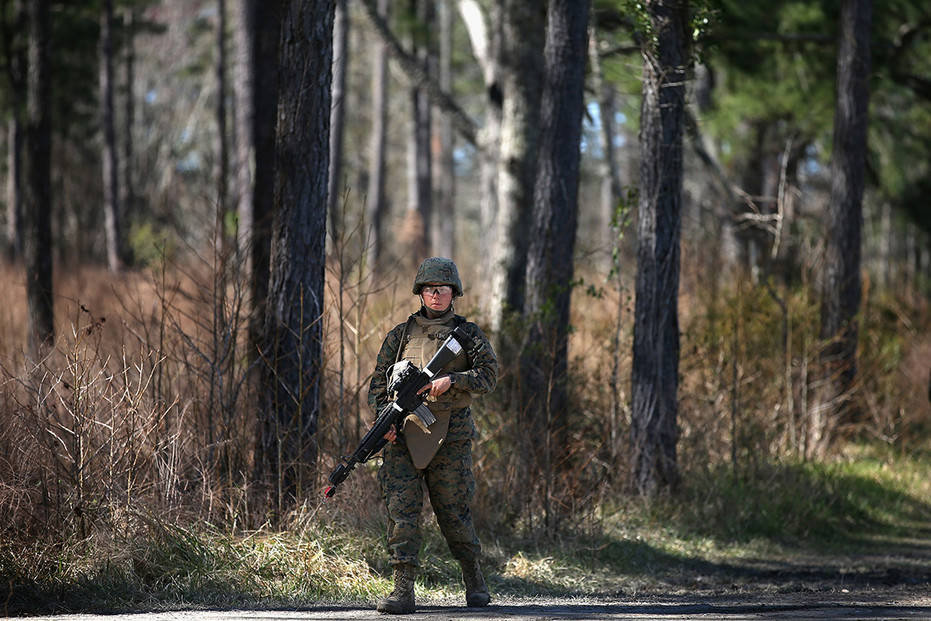 Pfc. Jennifer Choruzek learns patrolling techniques during Marine Combat Training in 2013 at Marine Corps Base Camp Lejeune, N.C.Scott Olson/Getty Images